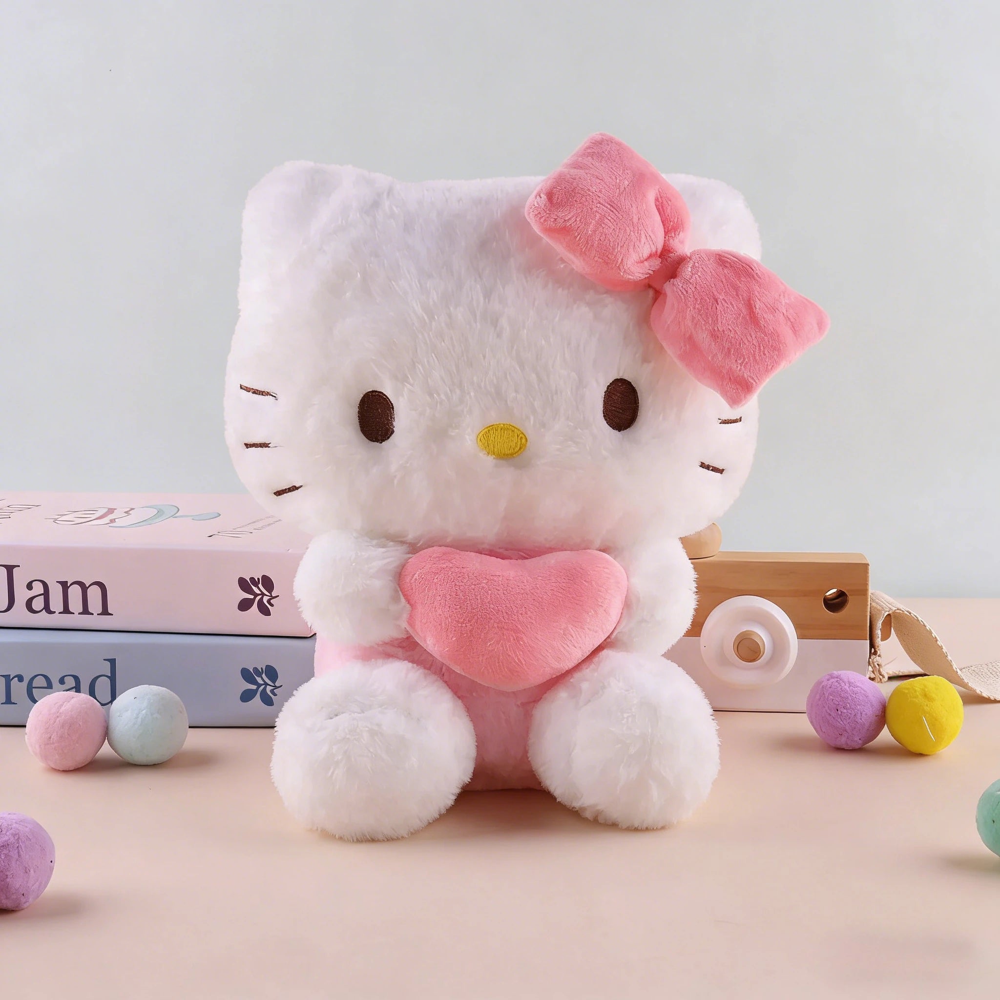 Peluche Hello Kitty Premium con Corazón Rosa (22cm)